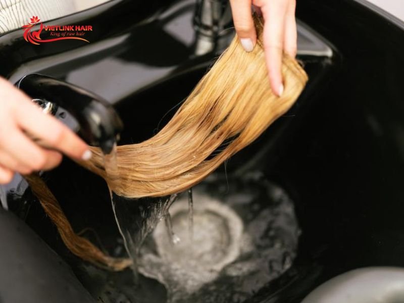 Let the lather gently cleanse the lengths without scrubbing to protect extension bonds.