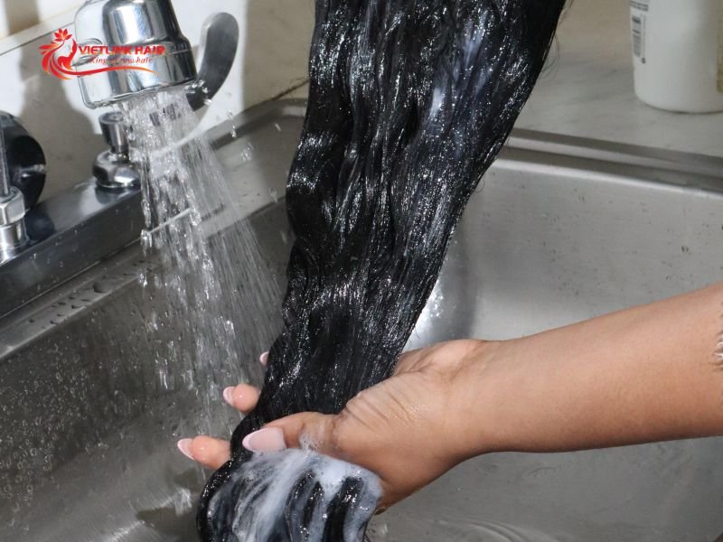 Rinse gently and condition the extensions after processing to maintain softness.